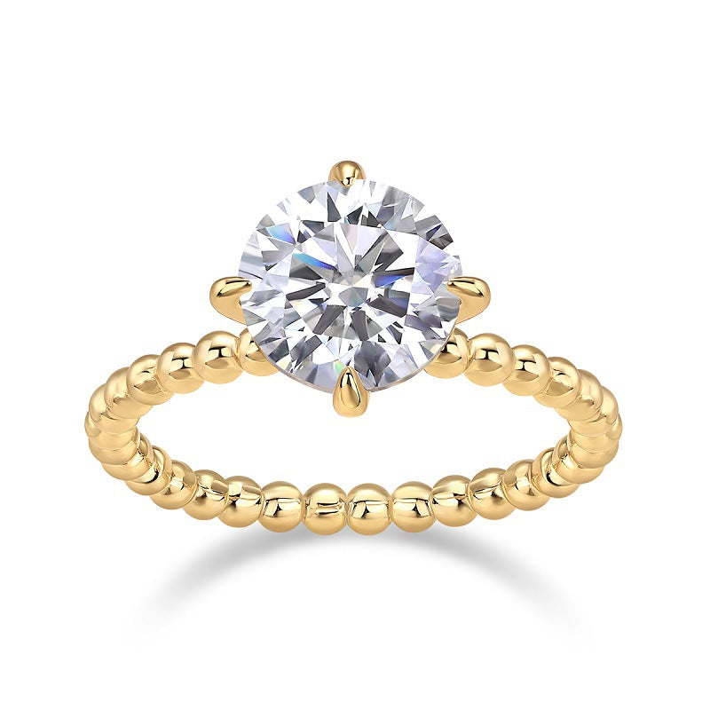 Gold-toned style 925 silver four-prong ring with moissanite comes with certificate