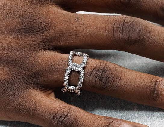 S925 sterling silver hollow twist ring for men and women hip hop open adjustable ring - MOWTE